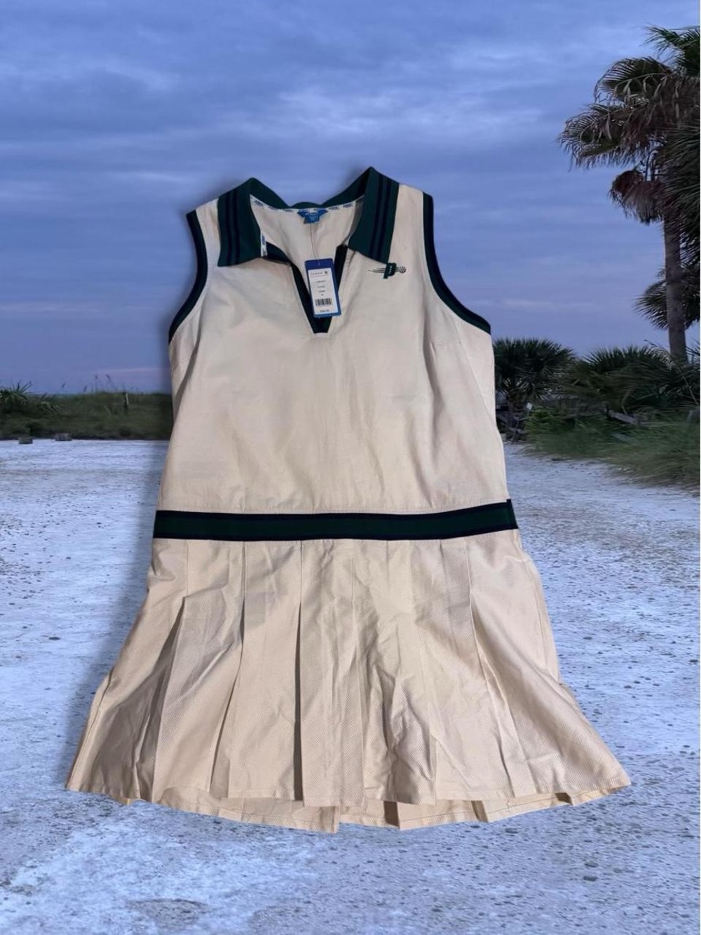 White tennis dress with green and blue trim